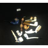 A selection of assorted ceramic and similar pipes including German and other origins