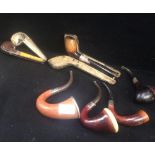 A Meerschaum pipe in fitted case and other similar items