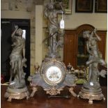 An early 20th century French clock garniture, the clock with spelter figure, 'Coup de Vent' by