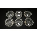 A set of six Edwardian cut-glass finger bowls