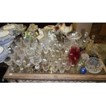 A set of eight cut-glass wine goblets and a collection of decorative glassware