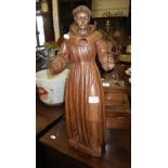 A carved wood Devotional figure of 'St Francis'