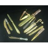 A selection of assorted brass and similar letter openers and page turners
