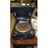 A vintage picnic gramophone supplied by Harrods Ltd