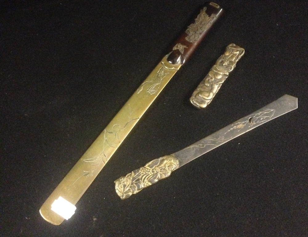 A Japanese bronze and hardwood page turner and two similar items