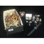 A box of costume jewellery bead necklaces, including some metalwork animal models
