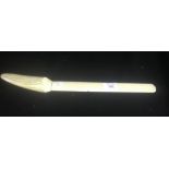 An ivory letter opener with similar blade