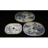 Three early 19th century blue and white glazed pottery strainers with Oriental pagoda decoration