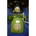 A reproduction black pyramid type telephone and a 1960's green GPO telephone (2)