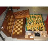 An Oriental chess set with chess board and similar items