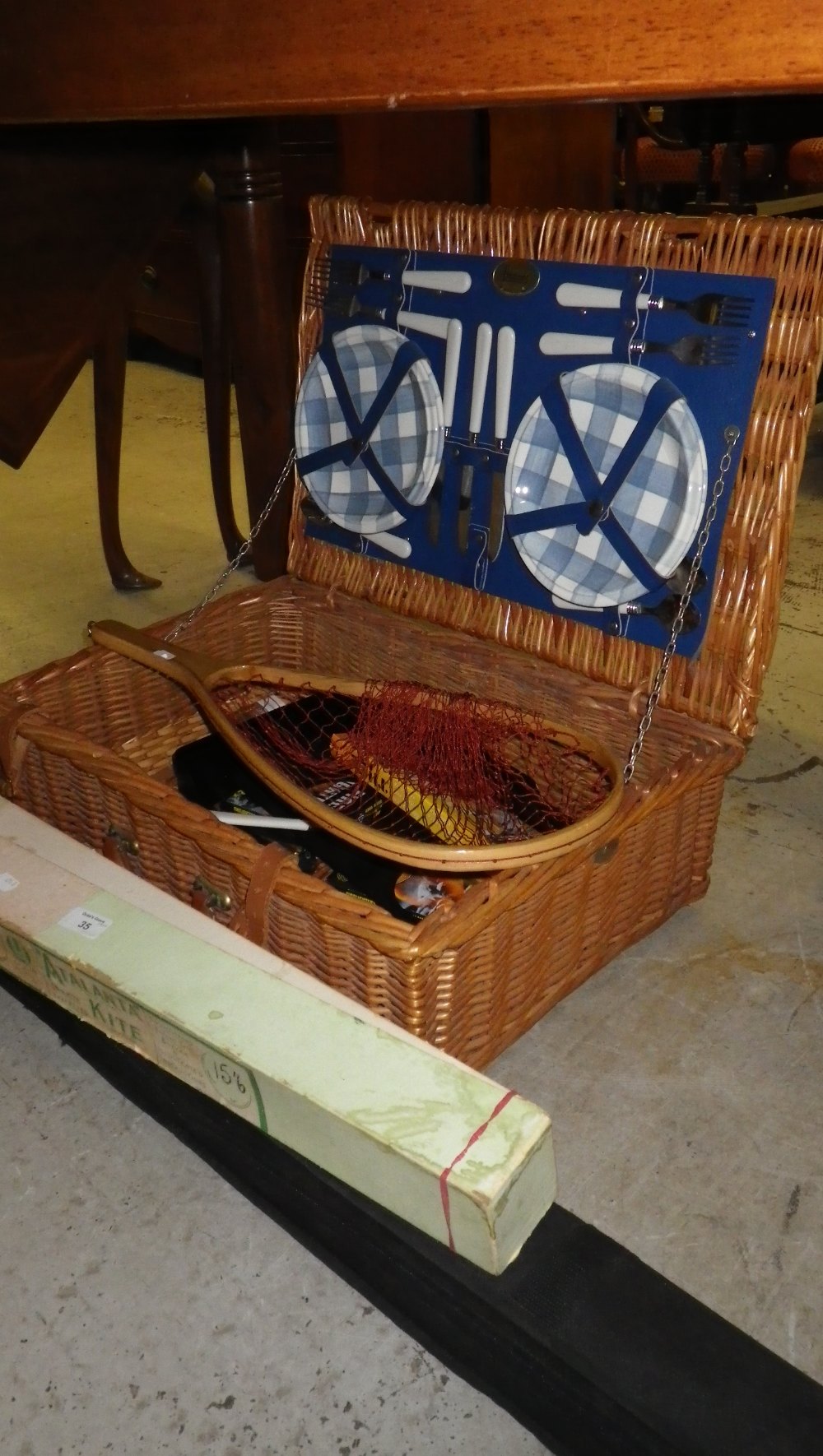 A wicker picnic hamper, a vintage kite and similar items