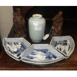 A pair of Oriental hardwood figures, a set of six Oriental blue and white dishes and a celadon vase