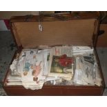 A quantity of vintage dressmaking patterns contained in a suitcase