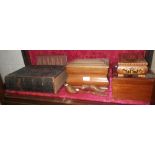 A 19th century mahogany tea caddy, a collection of wooden items, a leather-covered Bible and two