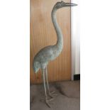 A patinised bronze study of an oriental crane 41.5" high