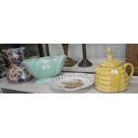 An ironstone jug, a 1930s crinoline lady teapot and similar ceramics