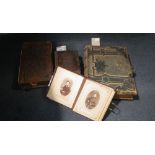 A quantity of Victorian leather-bound photograph albums containing an assortment of photographs