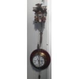 A brass cased ships clock and a cuckoo clock