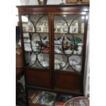 An Edwardian mahogany display cabinet with ebonised glazing bars, 69" high x 41" wide