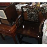 A Chinese hardwood armchair, with carved and mother-of-pearl inlaid back, together with a Chinese