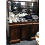 A Victorian mahogany sideboard, with moulded frieze drawer, over three cupboards, with rectangular