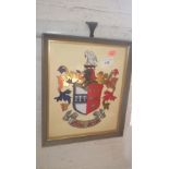 A hand painted on glass heraldic coat of arms