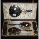 A silver and tortoiseshell mounted six piece dressing table set in fitted box