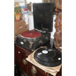 A Vintage "Tyrela" picnic gramophone and a collection of 78s