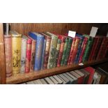 A collection of late 19th century books with decorated cloth bindings, together with various 19th