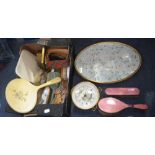 A collection of assorted dressing table brushes, mirrors and other items