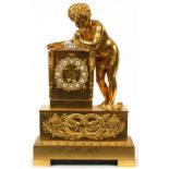 REGENCY GILT BRONZE MANTEL CLOCK, 19TH C., H  19", W 12", D 5", BOY BLOWING A BUBBLE: Raised  on a