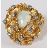 18KT YELLOW GOLD DIAMOND AND OPAL RING, SIZE  6,TW. 14 GR.: Teardrop shape opal. Twelve full  cut