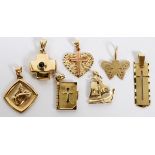 14KT YELLOW GOLD RELIGIOUS CHARMS, 7 PCS.:  three cross pendants one with heart shape  pierced leaf