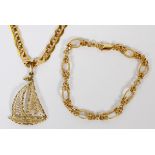 14KT YELLOW GOLD PENDANT, 10KT CHAIN AND 10KT  BRACELET, 3 PCS. L 21" CHAIN 7" BRACELET:  having a