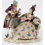 GERMAN PORCELAIN FIGURE PLATEAU, H 11.25", L  10.2", D 7": A courting scene depicting a man