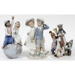 LLADRO PORCELAIN FIGURES OF CHILDREN, THREE, H  8"-10": Including "The Snowman", #5713; "A  World