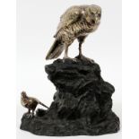 PATINATED BRONZE BIRD SCULPTURE, H 11 1/2" W 9":  Depicting two silvered bronze birds perched on  a