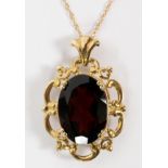 14KT YELLOW GOLD CHAIN WITH GARNET AND 10KT  PENDANT, 2 PCS.,: having an oval cut garnet  mounted