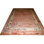 CHINESE CARPET, HAND MADE 8'4" X 12': Pink  field, beige border. Accents of brown leaves.  Circa