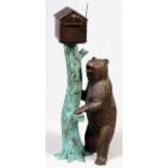 BRONZE BEAR AND MAILBOX SCULPTURE H 51": Bear  on hind legs standing next to mail box.