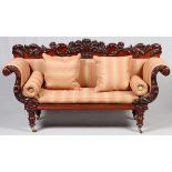 ENGLISH VICTORIAN CARVED MAHOGANY SOFA, C. 1845,  H 44" L 80" D 24": Ornately carved scrolling