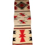 NAVAJO WOOL THREE-SECTION RUG, 4' 6" X 1' 7":  In shades of beige, red, gray and black.