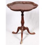 MAHOGANY PEDESTAL TABLE H 30": having a  contoured pie crust rim, turned spindle pedestal  with