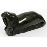 ESKIMO CARVED SOAPSTONE WALRUS, H 4", L 10":  depicts a walrus carved in dark stone. Appears  to be