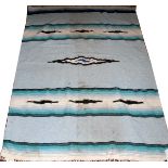 SOUTHWEST AMERICAN WOOL RUG, W 4' 5", L 6' 1":  Blue ground, linear and diamond motifs.