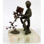 BRONZE & ONYX SCULPTURE, 20TH C., H 8 1/2" W 7  3/4", BOY READING: Bronze sculpture of a boy