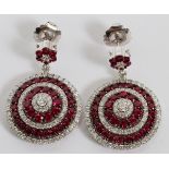 7.50CT RUBY & DIAMOND ROULETTE DANGLE CLUSTER  EARRINGS, PAIR, L 1 1/2": A pair of 18kt white  gold