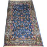 KERMAN PERSIAN RUG, ANTIQUE, 5' 0" X 3' 0":  Light blue ground.