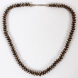 NAVAJO SILVER NECKLACE MADE WITH DISCS, L 20":  Circa 1930-40.