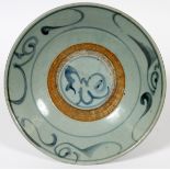 THAI SAWANKHOLOK PALE BLUE BOWL, DIA 10 1/2":  having a light blue ground with scallop designs.